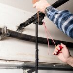 How To Save Money On Garage Door Repairs